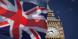 British union jack flag and Big Ben Clock Tower at city of westminster in the background – UK votes to leave the EU