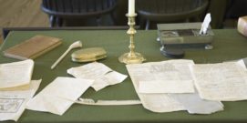 Restored Assembly Room displaying 18th century papers in Independence Hall, Philadelphia, Pennsylvania, one of the meeting places of the Second Continental Congress, where the Declaration of Independence and the Constitution were also debated, adopted, and signed. Future Presidents Washington, John Adams, Jefferson, Madison, and Monroe helped found the Nation in this room.