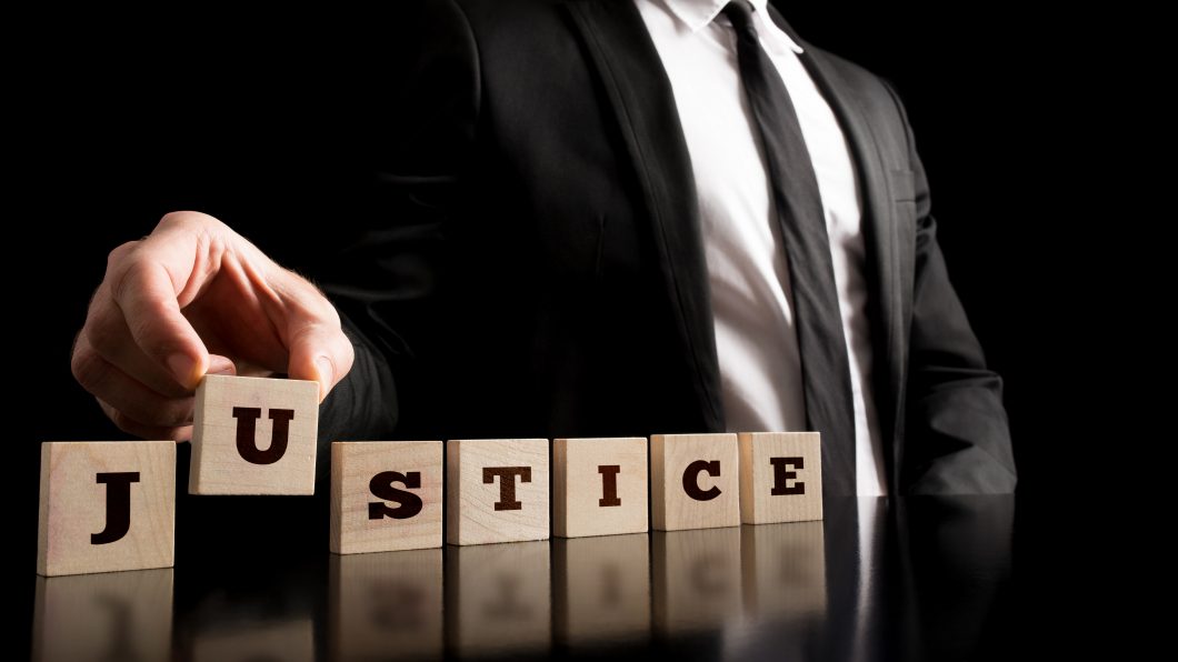 Justice on Wooden Piece Arranged by Businessman
