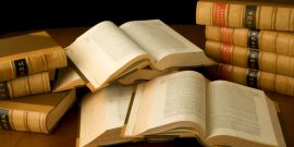 Law books open on table