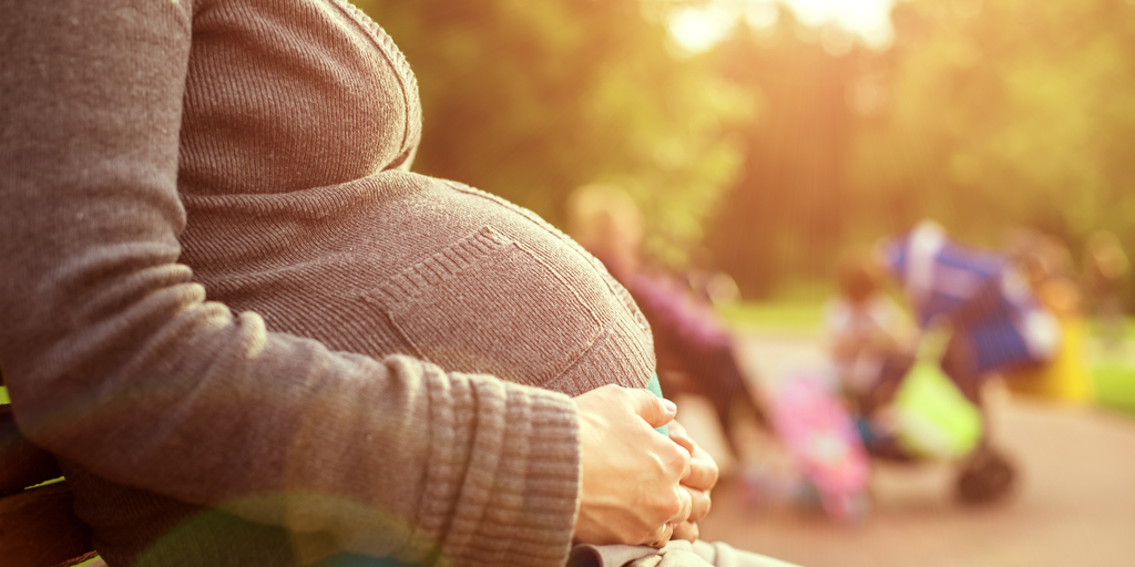 Pregnant Woman on Bench