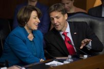 Washington, District of Columbia, USA. 4th Sep, 2018. Senator Amy Klobachar, Democrat of Minnesota and Senator Ben Sasse, Republican of Nebraska, speak during the confirmation hearing of Judge Brett Kavanaugh before the United States Senate Judiciary Comm