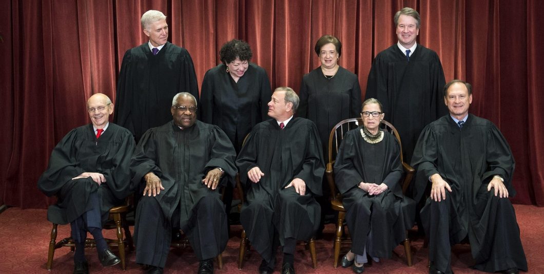 November 30, 2018 – Washington, District of Columbia, U.S. – The Supreme Court Justices pose for their official group portrait in the Supreme Court on November 30, 2018 in Washington, DC Seated from left: Associate Justice Stephen Breyer, Associate Justic