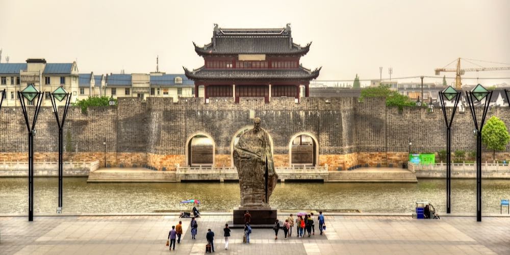 Statue of Fan Zhongyan and Pingmen Gate in Suzhou – China