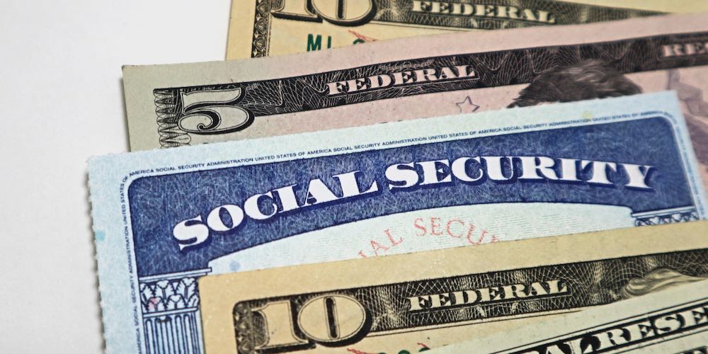 Image of social security card and money.