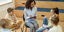 therapist with children_shutterstock_2421470103