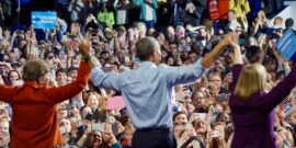 President,Holds,Hands,Up,High,At,End,Of,Speech,,Political