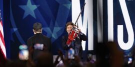 Elon Musk and Javier Milei with chainsaw_25055262314493